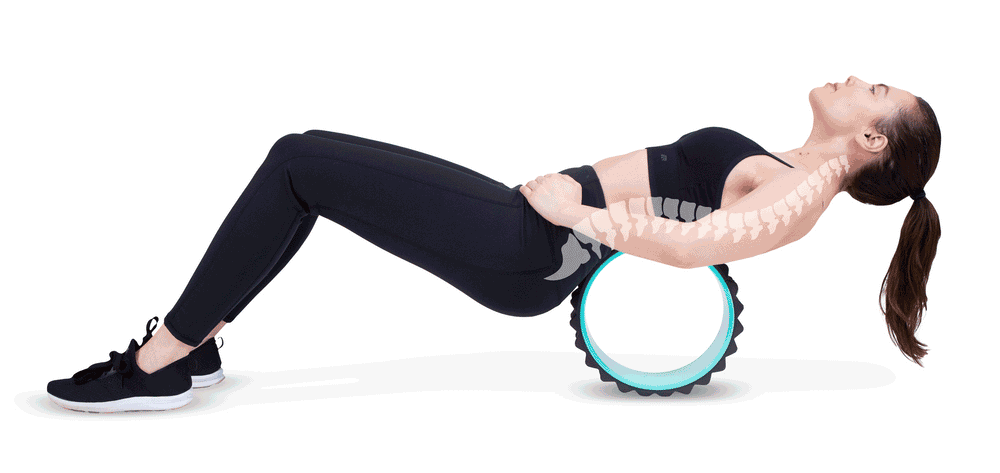 Woman using the Chirp Wheel XR while showing an example of her spine shape