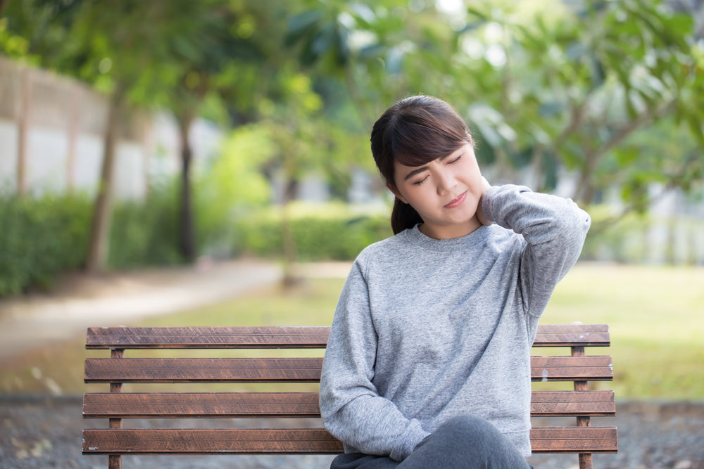 Girl with neck pain