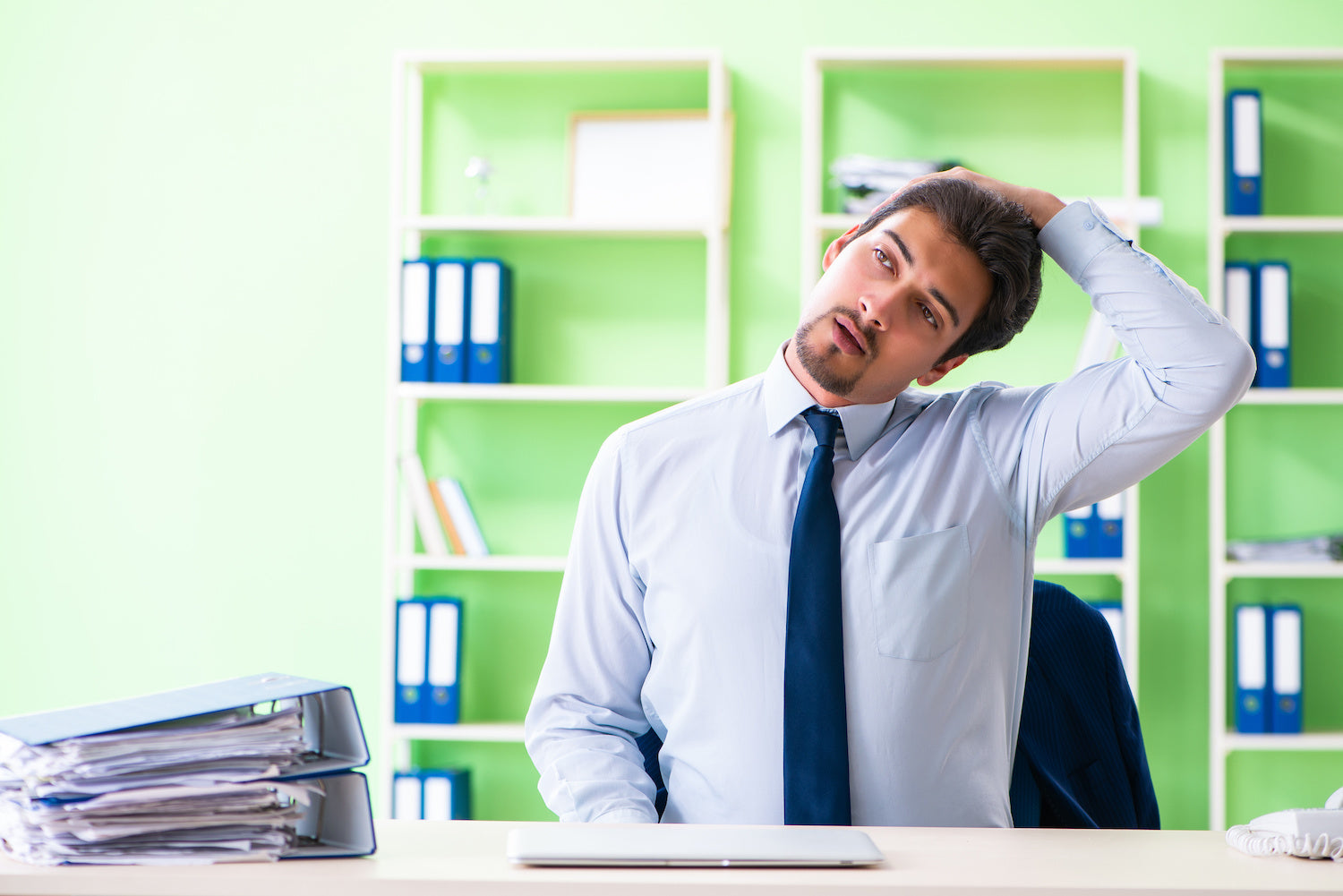 4 Easy Neck Stretches You Can Do at Your Desk to Make the Pain Go Away
