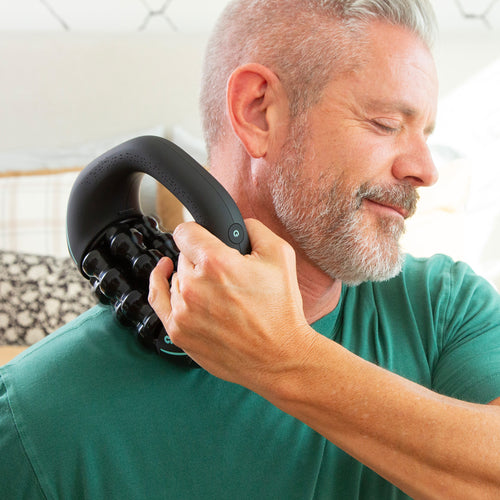 Man using Chirp RPM mini on shoulder