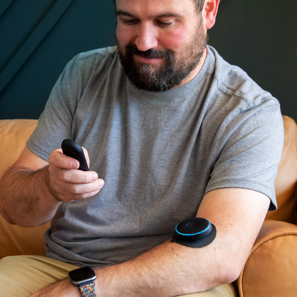 A man using the Chirp Halo on his forearm